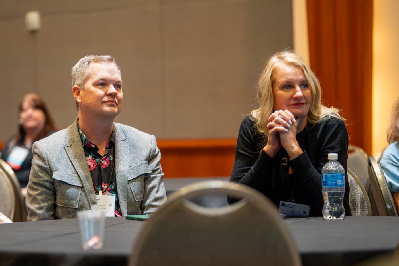 Attendees networking at a NAHCR annual conference session